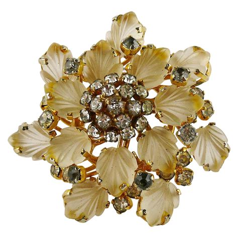 vintage christian dior brooches.